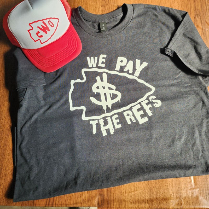 White "We Pay The Refs" on Black Shirt