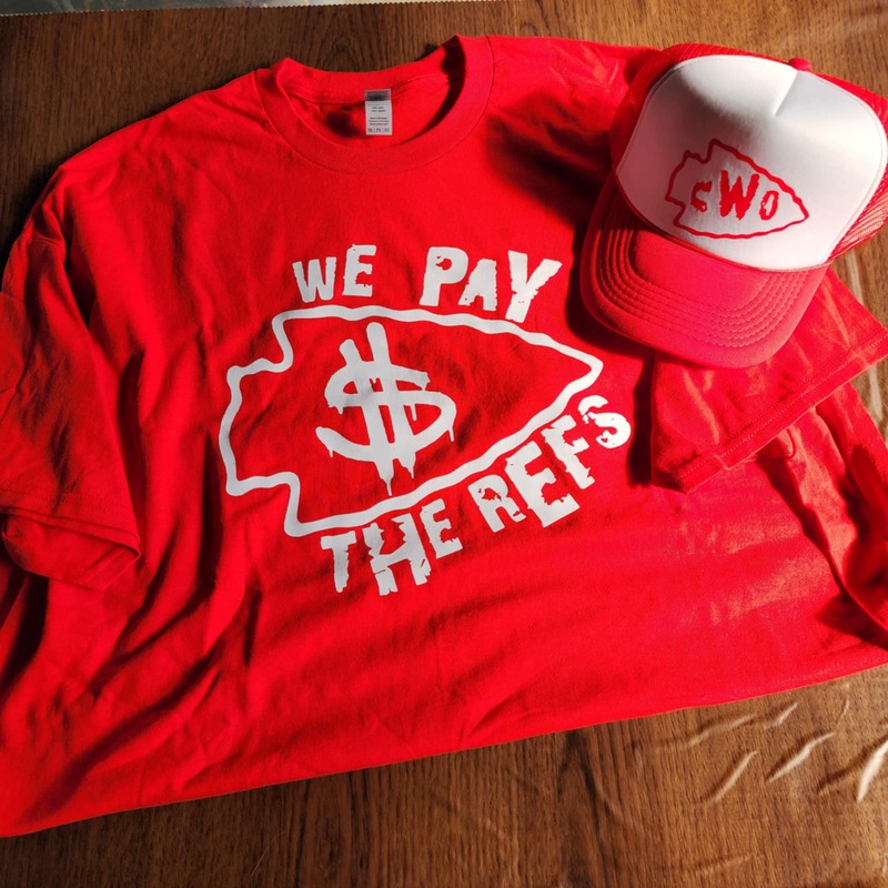 White "We Pay The Refs" on Red Shirt